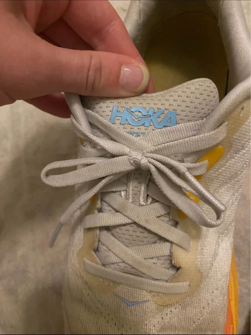 Hoka Womens Sneaker — White Upper with Yellow and Orange Sole